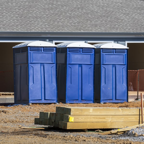 what is the cost difference between standard and deluxe portable toilet rentals in Lexington